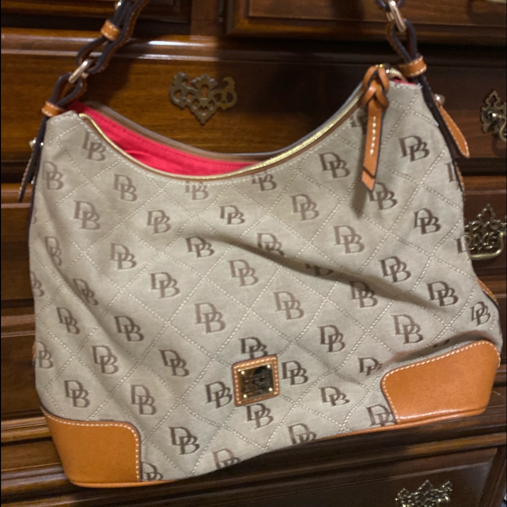 Never used dooney and Bourke purse